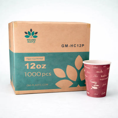 Cardboard box of Golden Maple paper cups with a sample cup on a white background