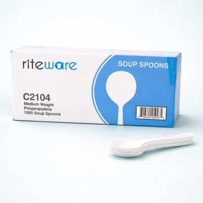 Box of riteware soup spoons with a small stack of spoons in front on a white background