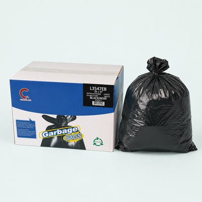Box of garbage bags with a black garbage bag on a white background